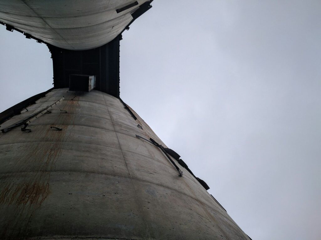 low angle photography of gray concrete building